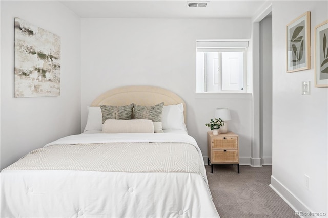 1755 Ingalls St, Lakewood, CO 80214 - carpeted bedroom featuring baseboards