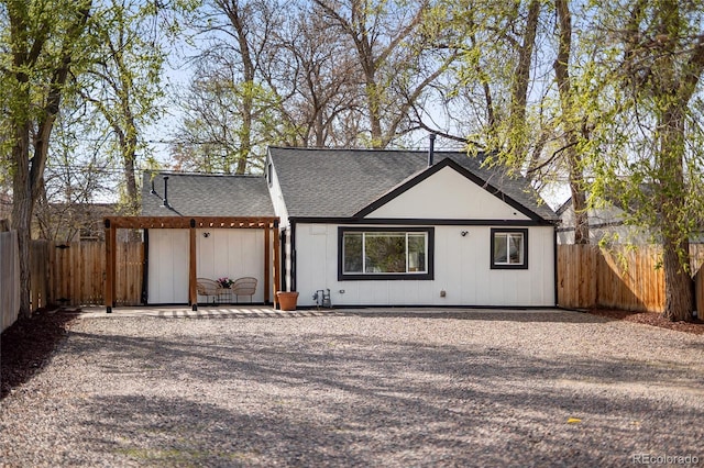 1755 Ingalls St, Lakewood, CO 80214 - view of front facade featuring roof with shingles