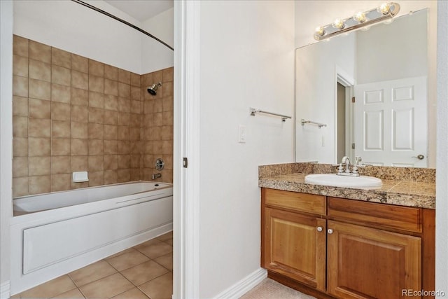 bathroom with shower / bathtub combination, baseboards, vanity, and tile patterned floors