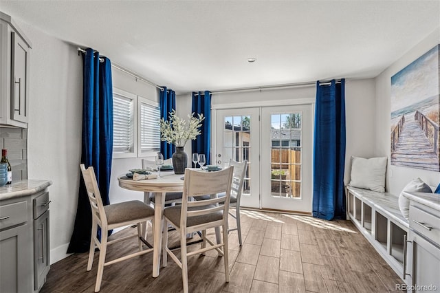 5202 Reed St, Arvada, CO 80002 - dining space with french doors and light wood finished floors