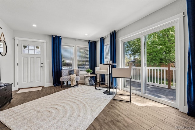 5202 Reed St, Arvada, CO 80002 - entrance foyer featuring healthy amount of natural light, wood finished floors, and recessed lighting