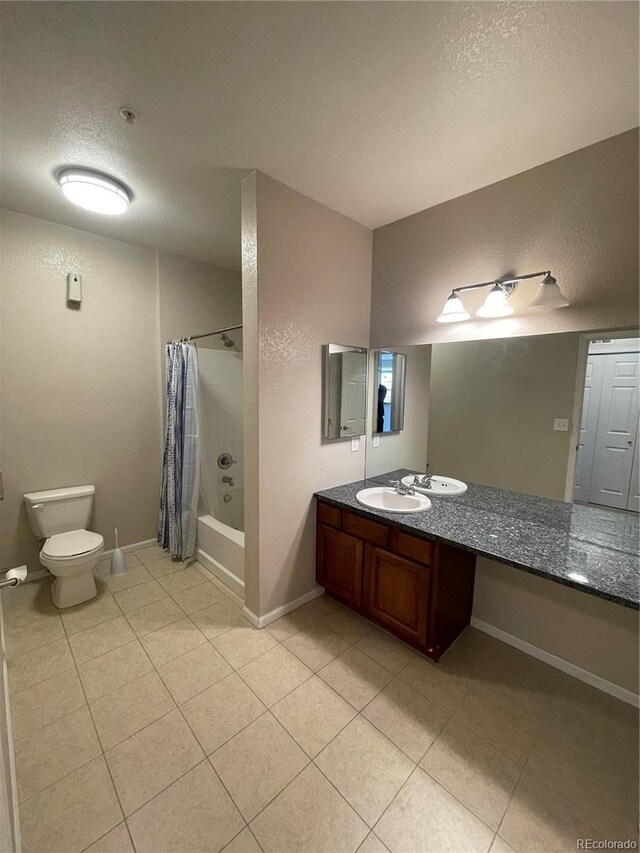 17346 Nature Walk Trl Unit 201, Parker, CO 80134 - bathroom with vanity, toilet, a textured ceiling, tile patterned flooring, and shower / bathtub combination with curtain