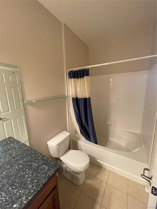 17346 Nature Walk Trl Unit 201, Parker, CO 80134 - full bath featuring tile patterned floors, shower / bathtub combination with curtain, vanity, toilet, and a textured wall