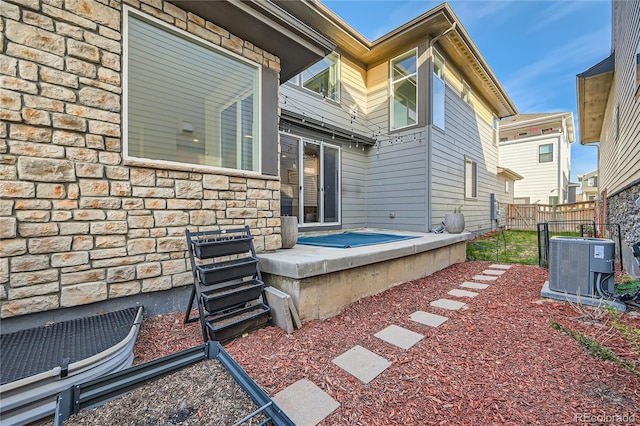 view of patio / terrace featuring cooling unit