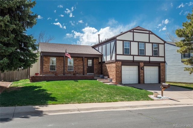 tudor-style house with driveway, a garage, and brick siding