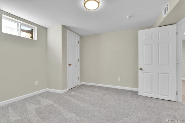 basement with light carpet