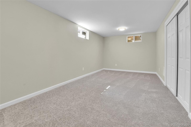 basement featuring carpet flooring