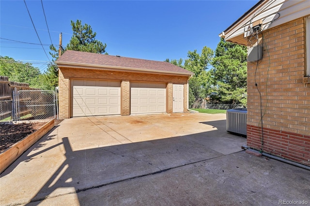 garage with central AC unit