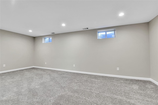 basement featuring carpet flooring