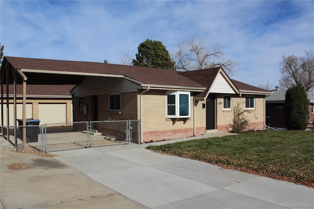 ranch-style house featuring crawl space, a front yard, fence, a gate, and driveway
