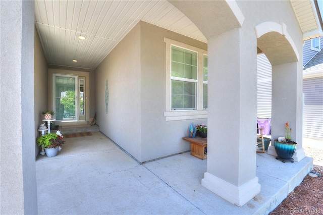20194 Robins Dr, Denver, CO 80249 - doorway to property with stucco siding