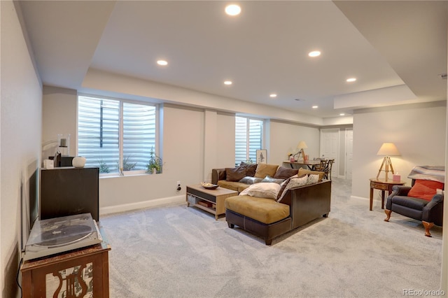 20194 Robins Dr, Denver, CO 80249 - carpeted living room with baseboards, a raised ceiling, and recessed lighting