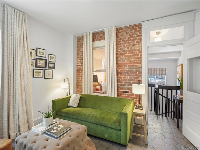 3914 Osage St, Denver, CO 80211 - tiled living area featuring brick wall
