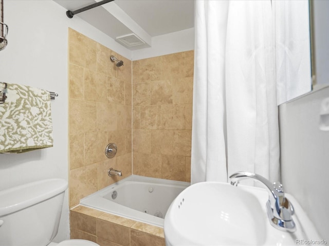 3914 Osage St, Denver, CO 80211 - bathroom with a sink, tiled shower / bath combo, and toilet