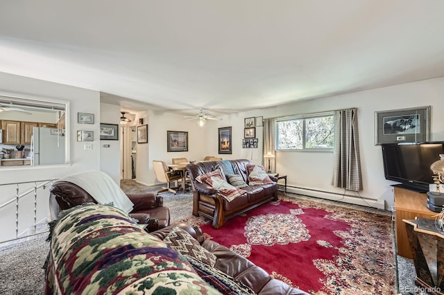 carpeted living room with a baseboard radiator and a ceiling fan