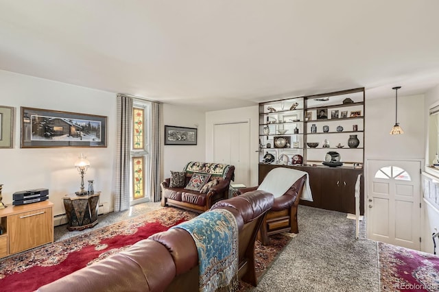carpeted living room featuring a baseboard radiator