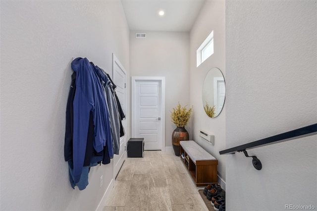 doorway with a towering ceiling