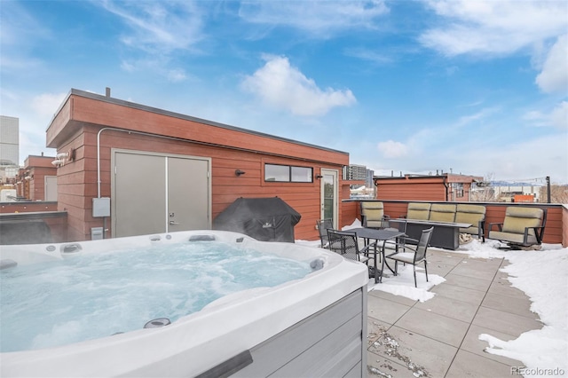 view of patio / terrace featuring a hot tub