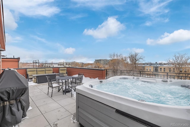 view of patio with a hot tub and grilling area