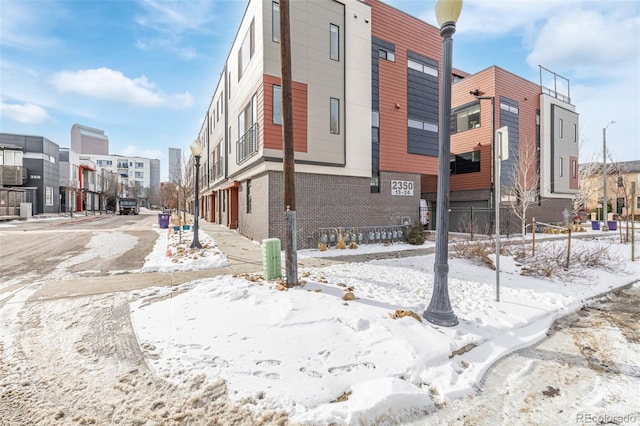 view of snow covered building