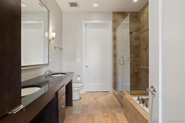 full bathroom with vanity, toilet, and shower with separate bathtub