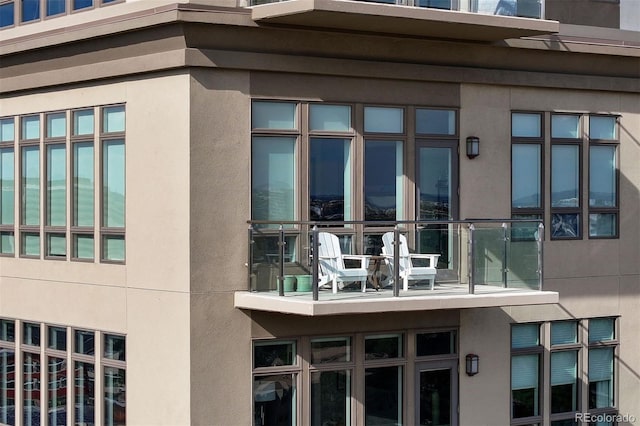 view of home's exterior featuring a balcony