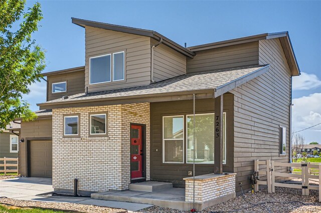 7263 Horsechestnut St, Wellington, CO 80549 - view of front facade with a shingled roof and concrete driveway