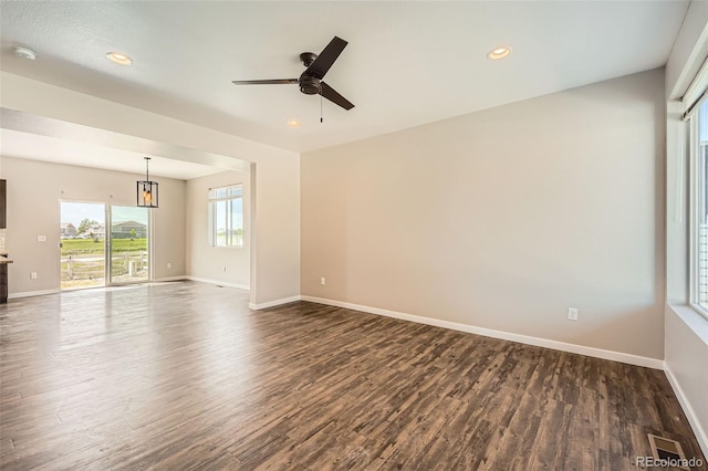 7263 Horsechestnut St, Wellington, CO 80549 - empty room featuring dark wood finished floors, ceiling fan, baseboards, a smoke detector, and recessed lighting