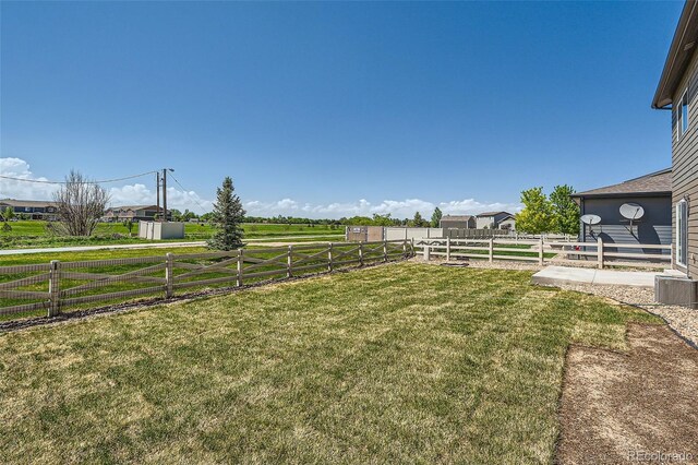 7263 Horsechestnut St, Wellington, CO 80549 - view of yard featuring central AC and a view of countryside