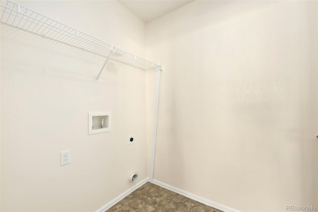 washroom with laundry area, hookup for a washing machine, baseboards, and hookup for an electric dryer