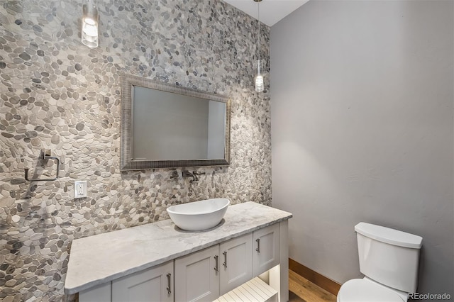 60 Barton Ridge Dr, Breckenridge, CO 80424 - bathroom featuring vanity, wood finished floors, and vaulted ceiling