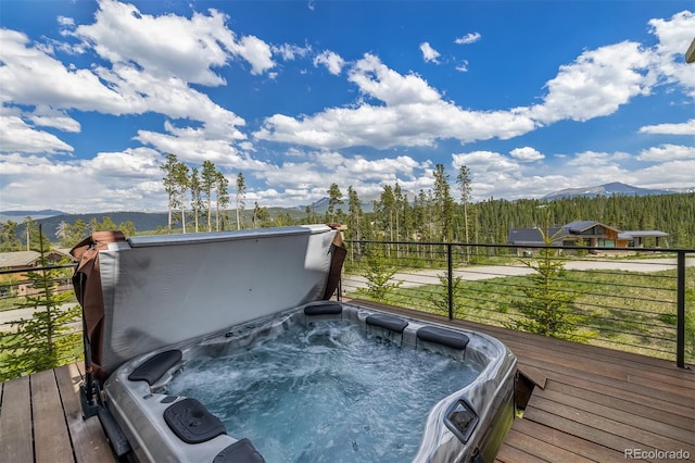 60 Barton Ridge Dr, Breckenridge, CO 80424 - deck featuring a mountain view and a hot tub