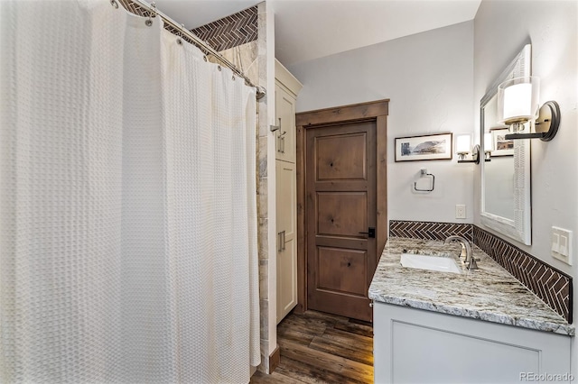 60 Barton Ridge Dr, Breckenridge, CO 80424 - bathroom featuring wood finished floors, vanity, and a shower with curtain
