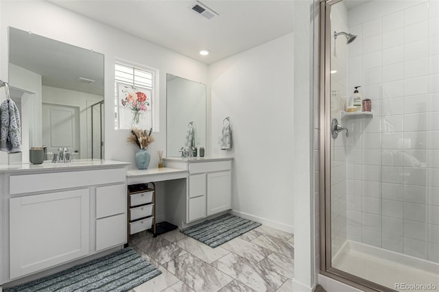 24326 E Ohio Dr, Aurora, CO 80018 - bathroom featuring a shower stall, vanity, marble look tile flooring, and recessed lighting
