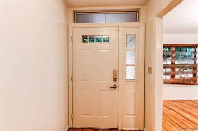 9614 W Powers Cir, Littleton, CO 80123 - entryway with wood finished floors