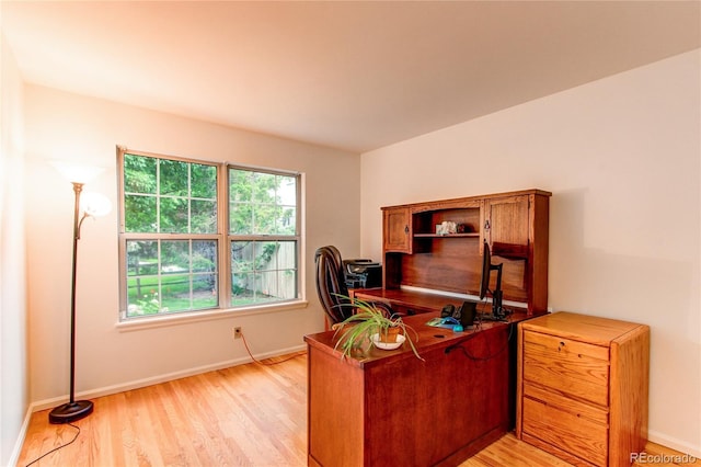 9614 W Powers Cir, Littleton, CO 80123 - office area with light wood-style floors and baseboards