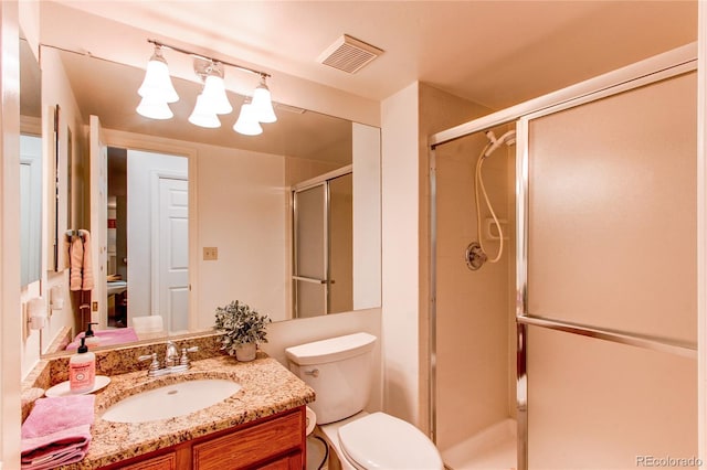 9614 W Powers Cir, Littleton, CO 80123 - bathroom featuring vanity and a shower stall