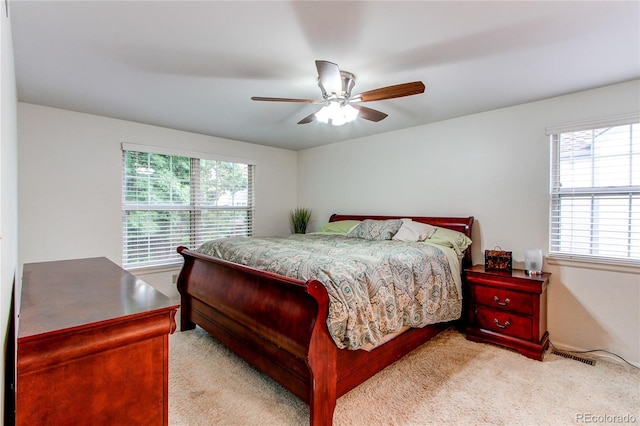 9614 W Powers Cir, Littleton, CO 80123 - carpeted bedroom featuring a ceiling fan