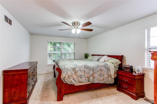 9614 W Powers Cir, Littleton, CO 80123 - bedroom featuring light colored carpet and ceiling fan