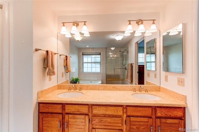 9614 W Powers Cir, Littleton, CO 80123 - full bathroom with a stall shower, double vanity, and a bath