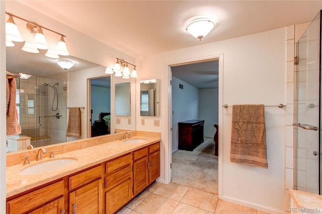 9614 W Powers Cir, Littleton, CO 80123 - full bathroom with a stall shower, tile patterned floors, and double vanity