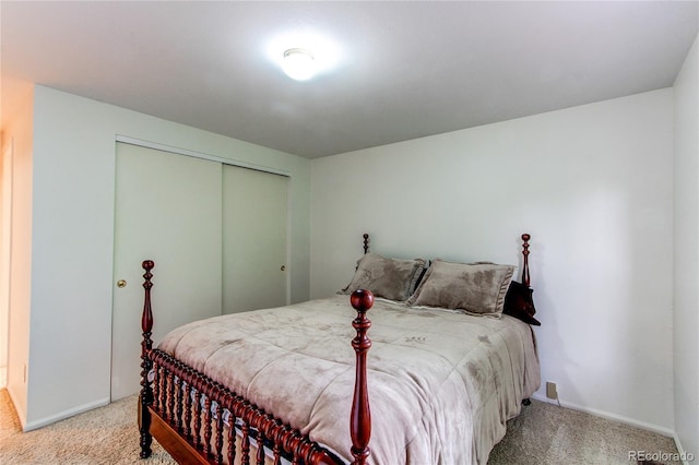 9614 W Powers Cir, Littleton, CO 80123 - bedroom with light colored carpet and a closet