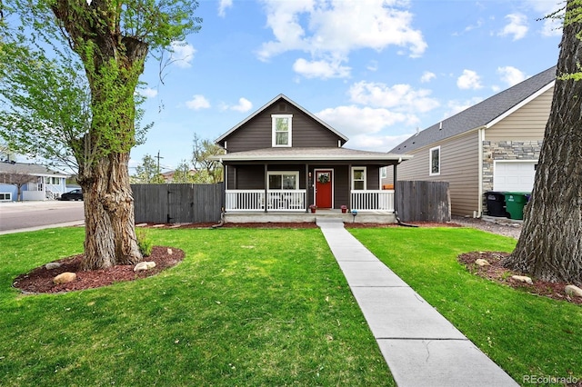 800 S Krameria St, Denver, CO 80224 - view of front of property featuring covered porch and a shingled roof