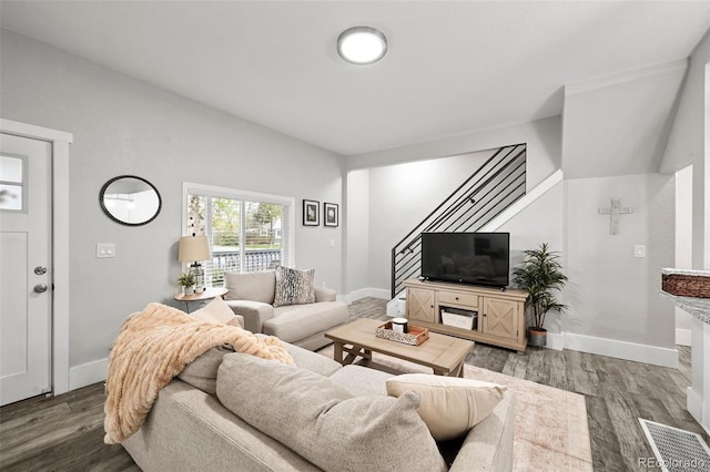 800 S Krameria St, Denver, CO 80224 - living room with stairs, wood finished floors, and baseboards