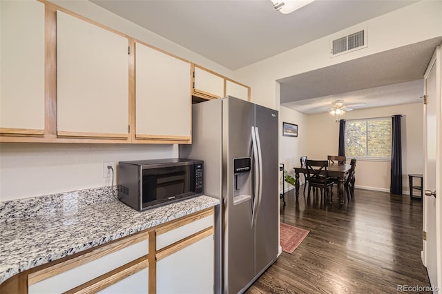 kitchen with dark wood-type flooring, ceiling fan, white cabinetry, and stainless steel fridge with ice dispenser