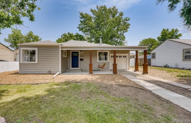 view of front of house with a porch and a front lawn