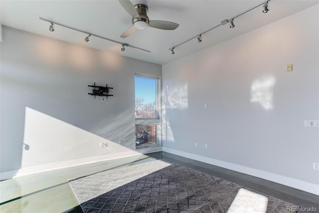 unfurnished room with ceiling fan