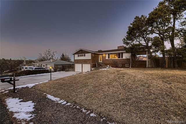 view of front of property with a garage