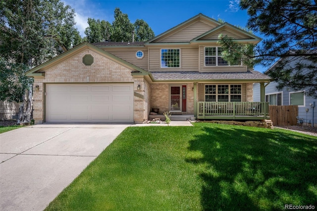 6285 Moccasin Pass Ct, Colorado Springs, CO 80919 - view of front of home with brick siding, driveway, a garage, covered porch, and a shingled roof