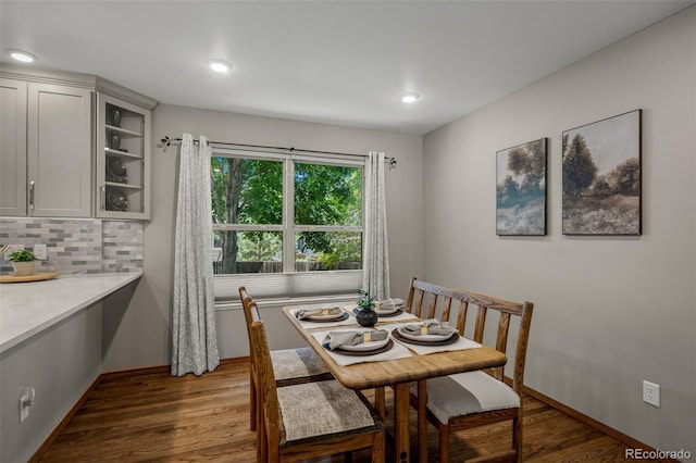 6285 Moccasin Pass Ct, Colorado Springs, CO 80919 - dining space with dark wood finished floors and recessed lighting